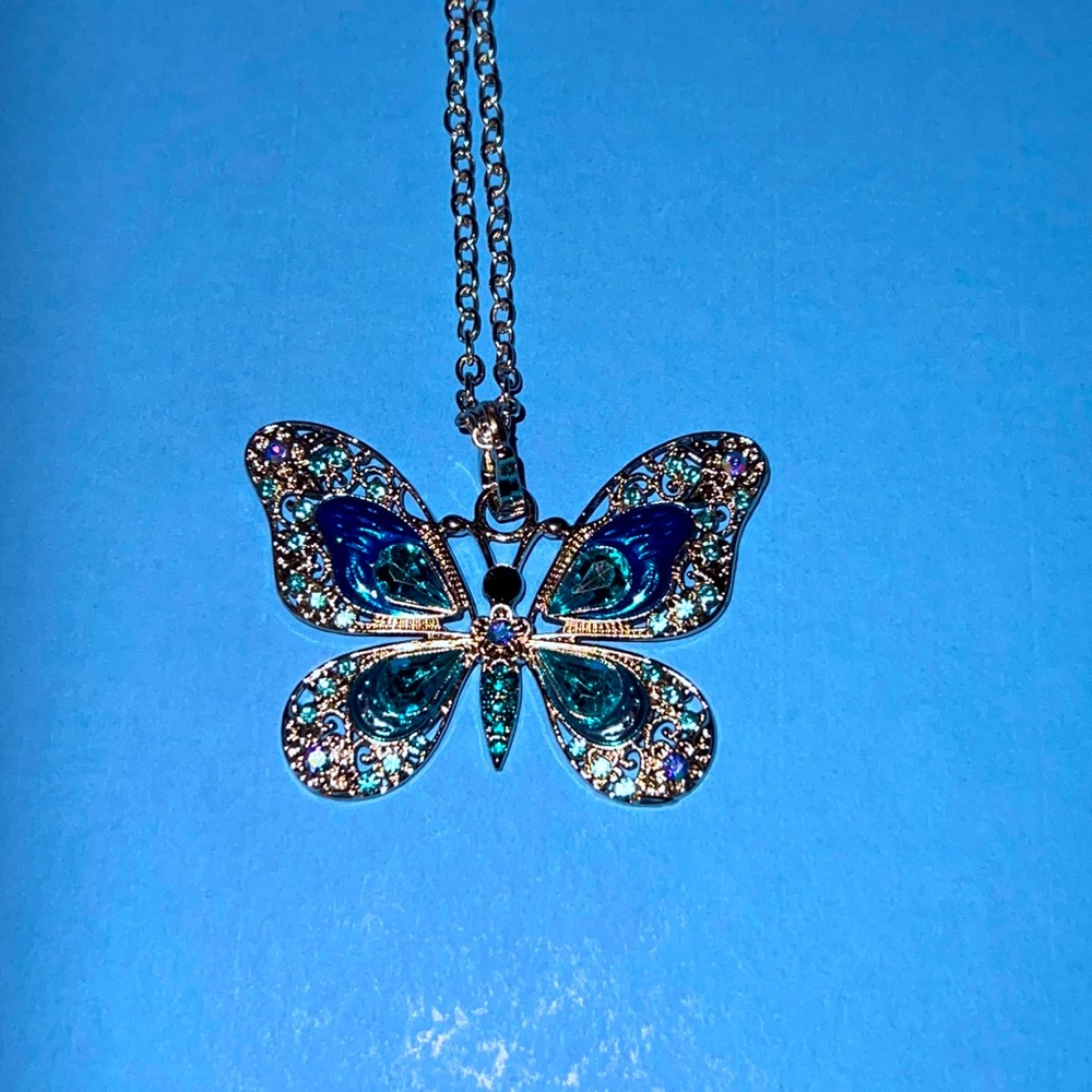 - Butterfly necklace. New.